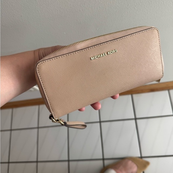 Michael Kors Handbags - Michael Kors Cream Wallet pebbled leather